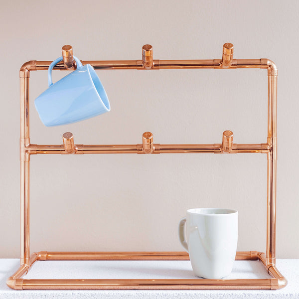 Copper Cup Stand – Industrial Display with Artisanal Charm