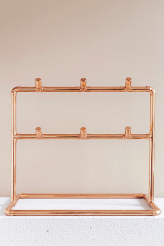 Copper Cup Stand – Industrial Display with Artisanal Charm