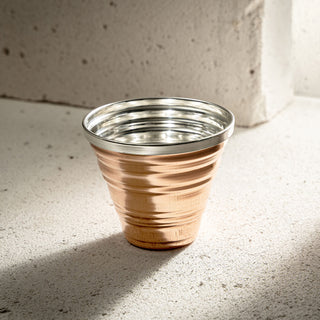 Serrated solid copper tumbler with a handcrafted design, shown in copper, silver, and heat-treated finishes.